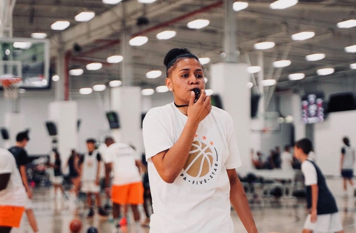 A BKN coach running a youth camp session